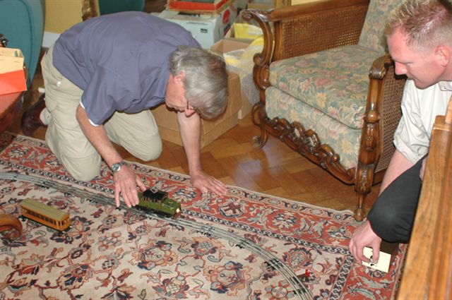 Playing trains on the floor